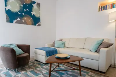 a living room with a couch and a coffee table at ALBA Apartment by Cadiz4Rentals in Cádiz