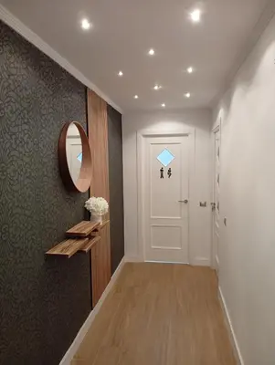 a bedroom with a bed and a couch and a window at Amplio Apartamento ARCOS in Arcos de la Frontera