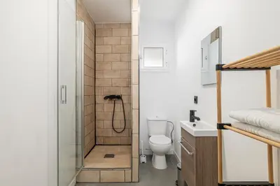a bathroom with a shower and a toilet at Chiclana Dreamhouse in Chiclana de la Frontera