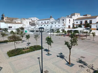 a courtyard with trees and a street light at El Sueño in Jerez de la Frontera