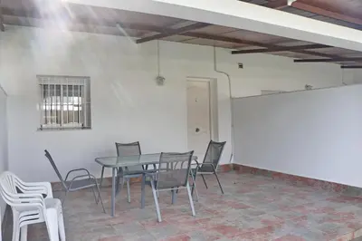 a dining room with a table and chairs at Apartamento Canario III in Conil de la Frontera