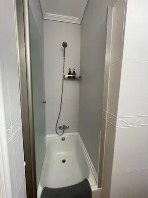 a bathroom with a shower with a toilet in it at Apartamento el Ancla in El Puerto de Santa María