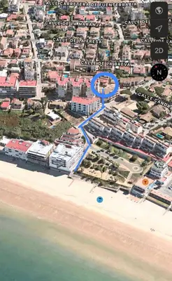 a map of a beach with a blue circle at Playa Fuentebravia apartament in El Puerto de Santa María