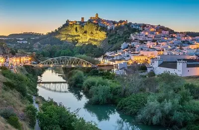 a view of a city with a bridge and a river at Las Manuelas in Arcos de la Frontera