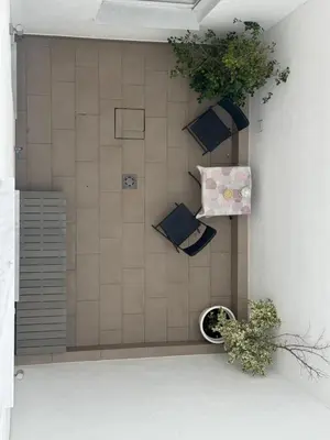 a rendering of a bathroom with pillows and plants at Austria 05 in Lebrija