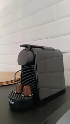 a toaster oven sitting on top of a table at Sherryflat Terraza San Francisco in Jerez de la Frontera