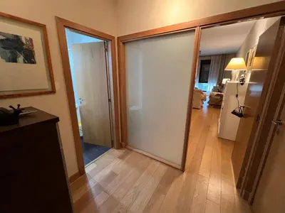 a hallway with sliding glass doors in a room at Apartamento Jerez in Jerez de la Frontera