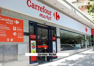 a caradium market sign on the side of a store at Apartalux Playa La Caleta in Cádiz