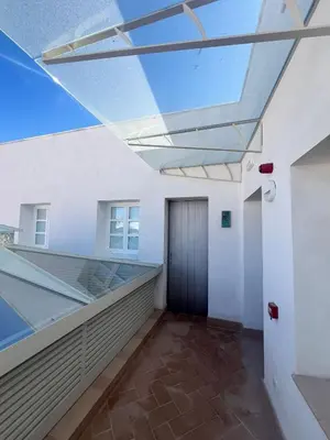 a skylight in a building with a hallway at Torre Camelia Adults recommended in Cádiz