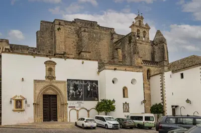 a church with cars parked in front of it at Allo Apartments Balderrama Parking Centro 1 Habitación in Jerez de la Frontera
