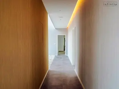 a hallway with a wall and a corridorngthngthngthngth at Eleven Views in Chipiona