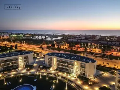 an aerial view of a city with the ocean at Eleven Views in Chipiona