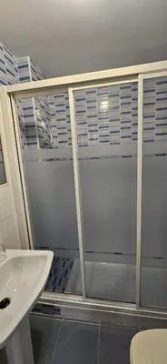 a bathroom with a shower and a sink at Valparaiso Arenas in El Puerto de Santa María