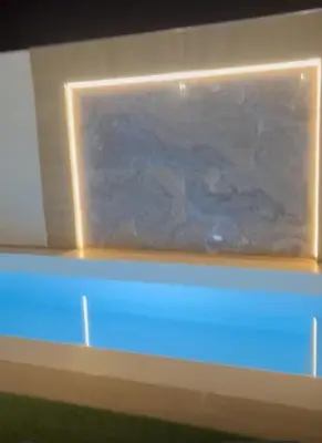 a shelf with a blue light on top of it at Jaimar12 in Novo Sancti Petri