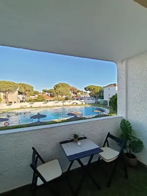 a wooden bridge in the middle of a forest at Cosy Apartment Views Pinares Almadraba in Rota