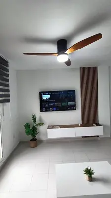 a living room with a couch and a table at Cosy Apartment Views Pinares Almadraba in Rota
