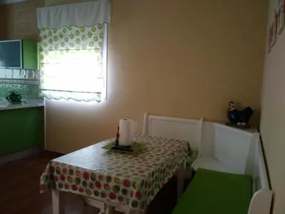 a kitchen with a table with a candle on it at Casa SUROESTE - Zona El Colorado, Conil de la Frontera in Roche