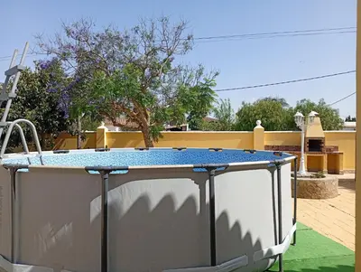 a ping pong table sitting on top of a patio at Casa SUROESTE - Zona El Colorado, Conil de la Frontera in Roche