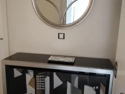 a mirror above a fireplace in a room at Cádiz Un respiro en Cádiz in Cádiz