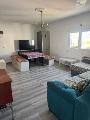 a living room with three couches and a couch at Churruca 3 Preferentemente para familias y mayores de 25 años in El Puerto de Santa María