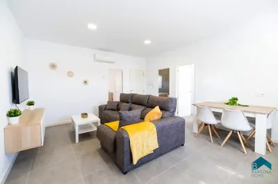 a living room with a couch and a table at Sauz A in Novo Sancti Petri