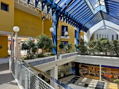 an indoor shopping mall with a glass ceiling at Larga Suite 46 - Ole Solutions in Jerez de la Frontera