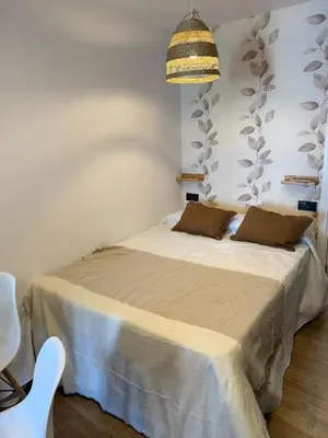 a bedroom with a bed in a room at Casita Las Palmeras 3 in Cádiz