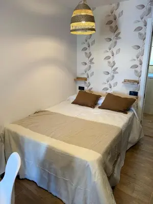 a bedroom with a bed in a room at Casita Las Palmeras 3 in Cádiz