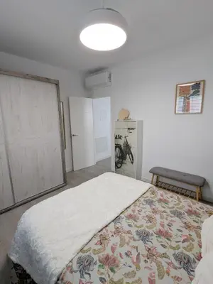 a bedroom with a large bed in a room at Apartamento Victoria in San Fernando