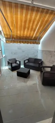 a living room with two couches and a wooden ceiling at 4 dormitorios Valdelagrana in El Puerto de Santa María