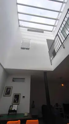 a skylight in a living room with a ceiling at EL Lucernario in Jerez de la Frontera