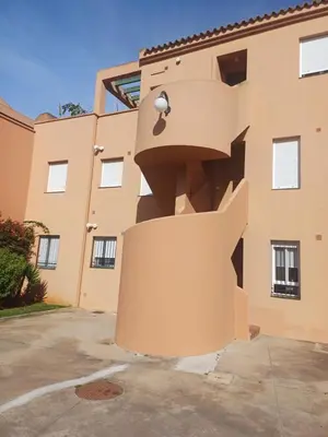 a staircase on the side of a building at Ático 