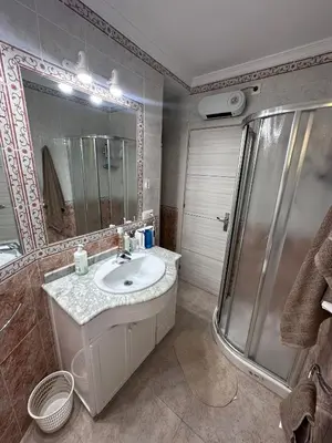 a bathroom with a sink and a shower at Chipiona playa in Chipiona