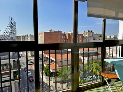 a view of a city from a window at Apartamento Sol Jerez - Ole Solutions in Jerez de la Frontera