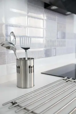 a kitchen counter with a container with a utensil in it at Royal Rent Sanlúcar Cerro Falón in Sanlúcar de Barrameda