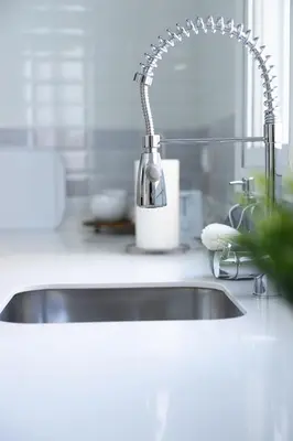 a kitchen sink with a faucet on a counter at Royal Rent Sanlúcar Cerro Falón in Sanlúcar de Barrameda