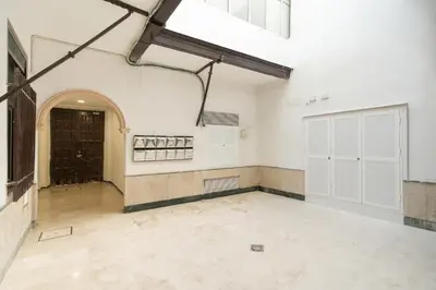 an empty room with white walls and a door at CDZ - Bella in Cádiz