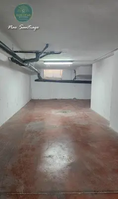 an empty room with a red floor and a window at Nao Santiago by Sanlúcar Housing in Sanlúcar de Barrameda