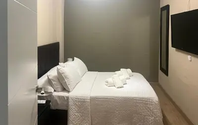 a bedroom with a bed with towels on it at Nice Home In Jerez De La Frontera in Jerez de la Frontera