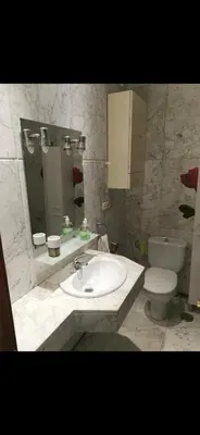 a bathroom with a sink and a toilet at Se alquilan habitaciones in Jerez de la Frontera