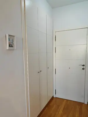 a room with white walls and a white closet at El Rincón de la Artista in San Fernando