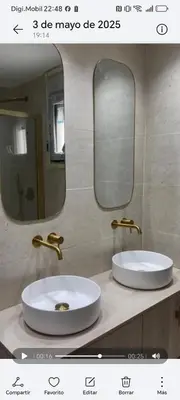 a bathroom with a sink and a mirror at Casa Isabel 29 in Chipiona