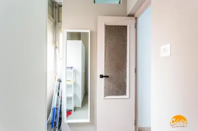 a hallway with a door and a mirror at Teresa Uno by Cadiz Time in Cádiz