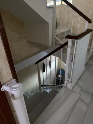 an overhead view of a staircase with a stair case at Casa Coplas muy cerca de la playa in Sanlúcar de Barrameda