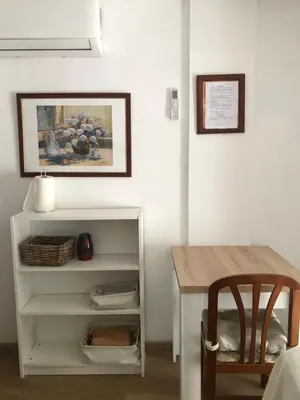 a room with a table and a table and a table and a table at Puerto centro in El Puerto de Santa María