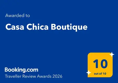 a yellow box with the words caasia china boutique at Casa Chica Boutique in Sanlúcar de Barrameda