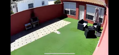 an aerial view of a yard with green grass at Corales 6 in El Puerto de Santa María