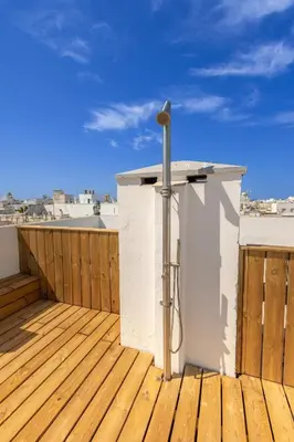a pole on the deck of a roof at Cadizz - Ático del Búho Surenyo - Terraza 100m2 privada in Cádiz