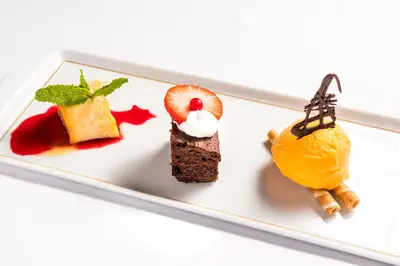 a plate of desserts on a white plate at Parador de Arcos de la Frontera in Arcos de la Frontera