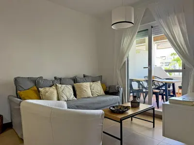 a living room with a couch and a table at Apartamento Brisa Candor - Ole Solutions in Rota